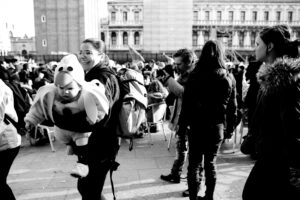 Venice-kid in carnival costume in St. Mark's square, black & white landscape photo