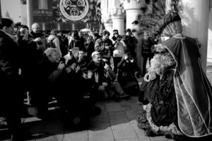 Venice-Photographers shooting at Carnival masks in St. Mark's square, black & white landscape photo
