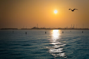 Venice - skyline of Porto Marghera at sunset, color landscape photo
