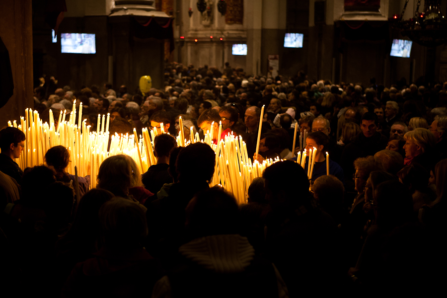 Venice - crowd assembled inside the Church of Salute, color landscape photo