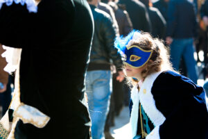 Venice - young girl in carnival costume, color landscape photo