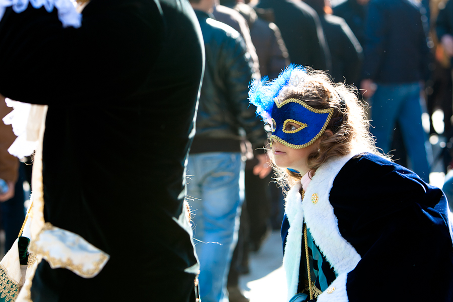 Venice - young girl in carnival costume, color landscape photo